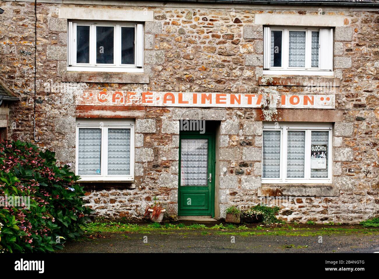 Abandoned village shop in Runan, a French municipality with 233 inhabitants in the Brittany region in the Côtes-d'Armor department. Stock Photo