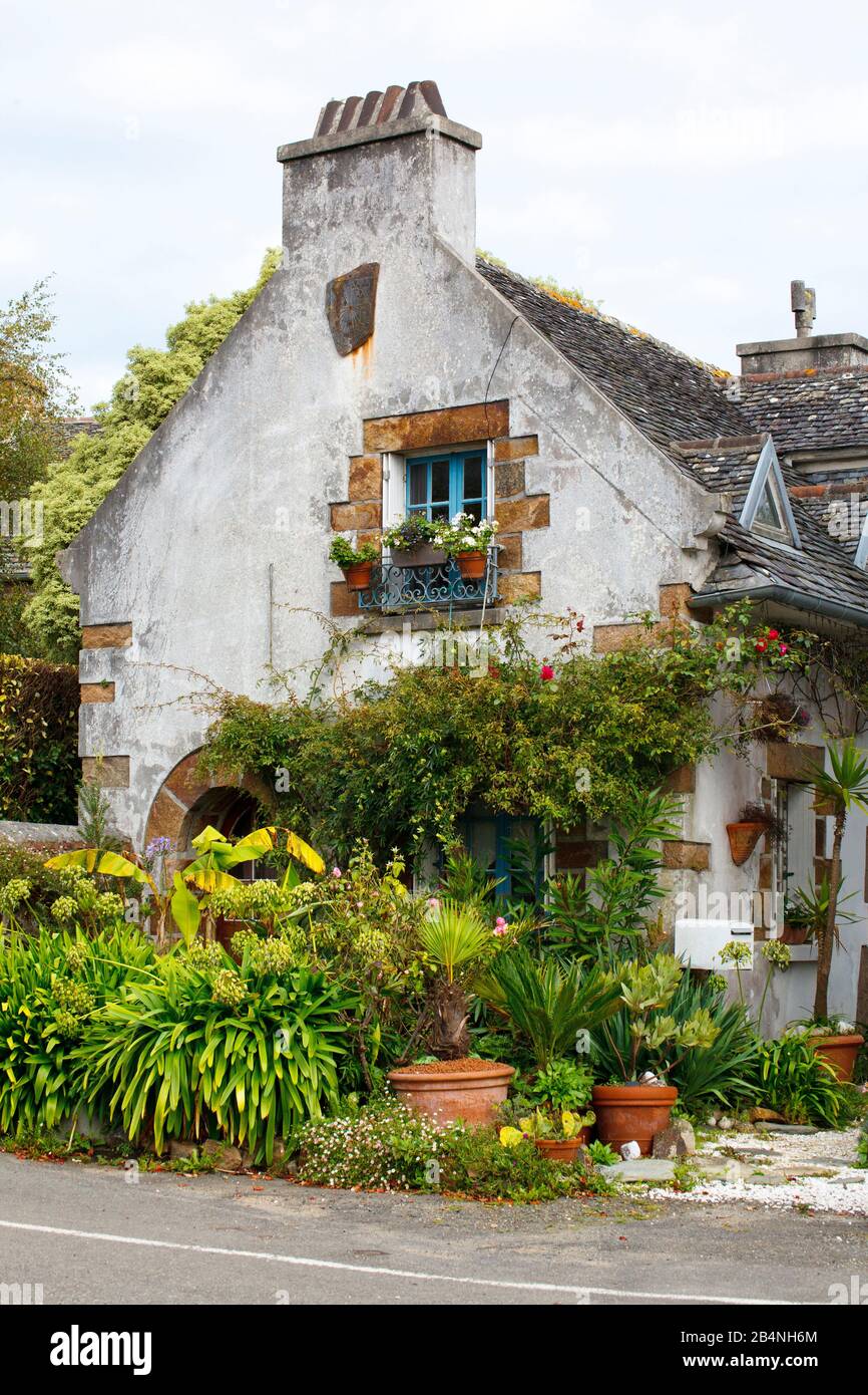 Private country house with garden at the house. In the Cote des Bruyeres region in the Finistère department. France. Stock Photo