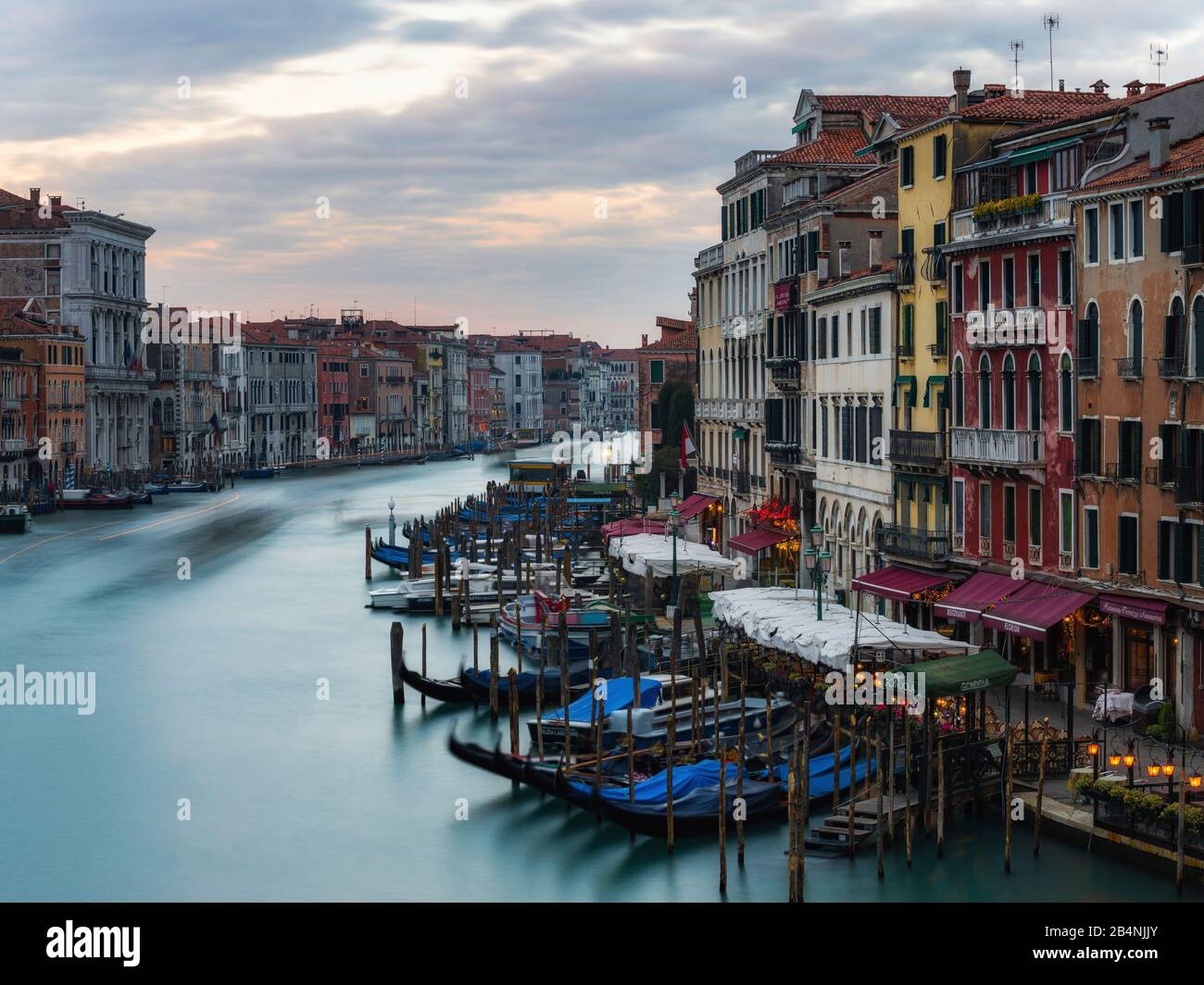 View from the Rialto Bridge, Grand Canal, Venice, Italy, gondolas long exposure, looking towards San Marco Stock Photo
