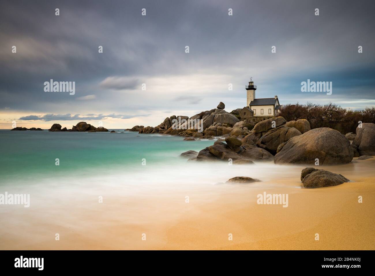 Pontusval lighthouse, Brittany, France, evening, long exposure Stock Photo