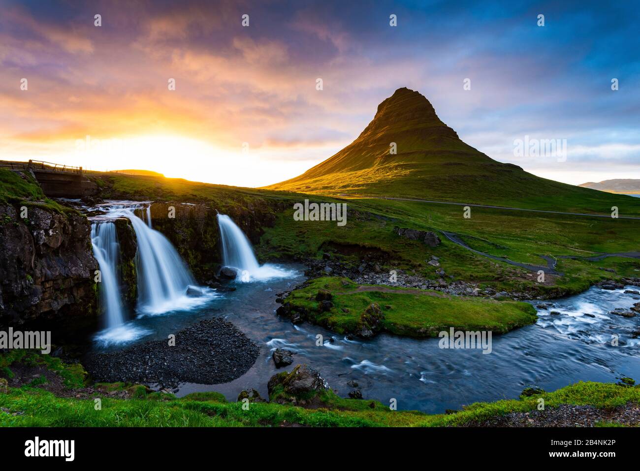 Midnight sun, Kirkjufellsfoss waterfall, Iceland Stock Photo