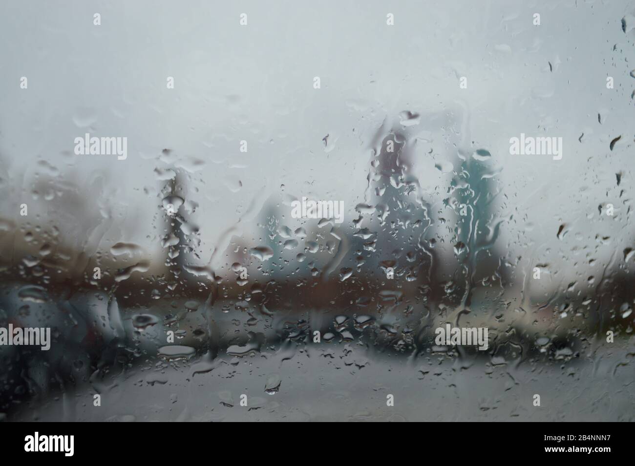 Residential high rises viewed through rain covered windshield. New York City - USA Stock Photo