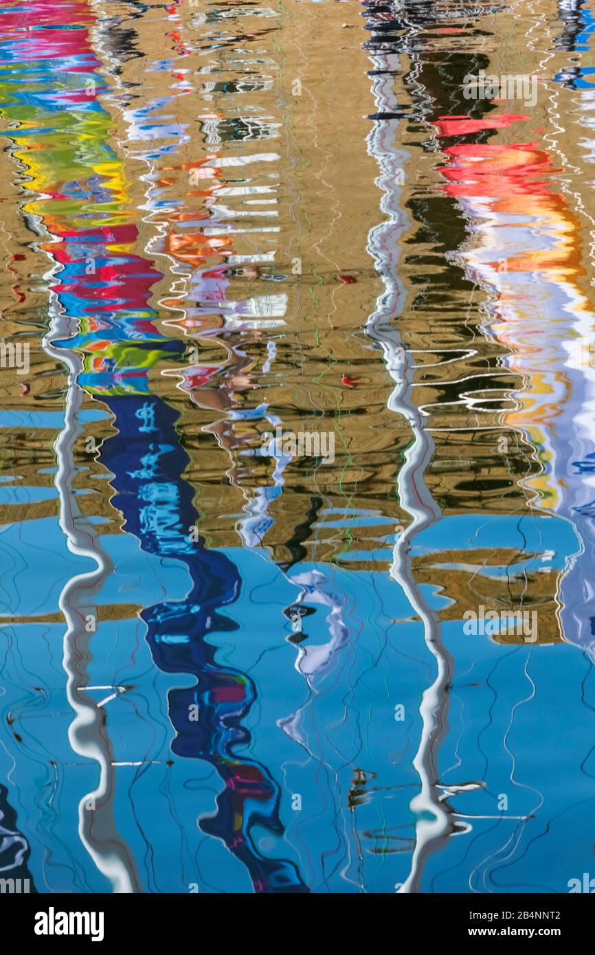 England, London, Wapping, St.Katharine Docks Marina, Reflection of Colourful Clippers Awaiting The Start of The Bi-Annual Clipper Round The World Yacht Race Stock Photo