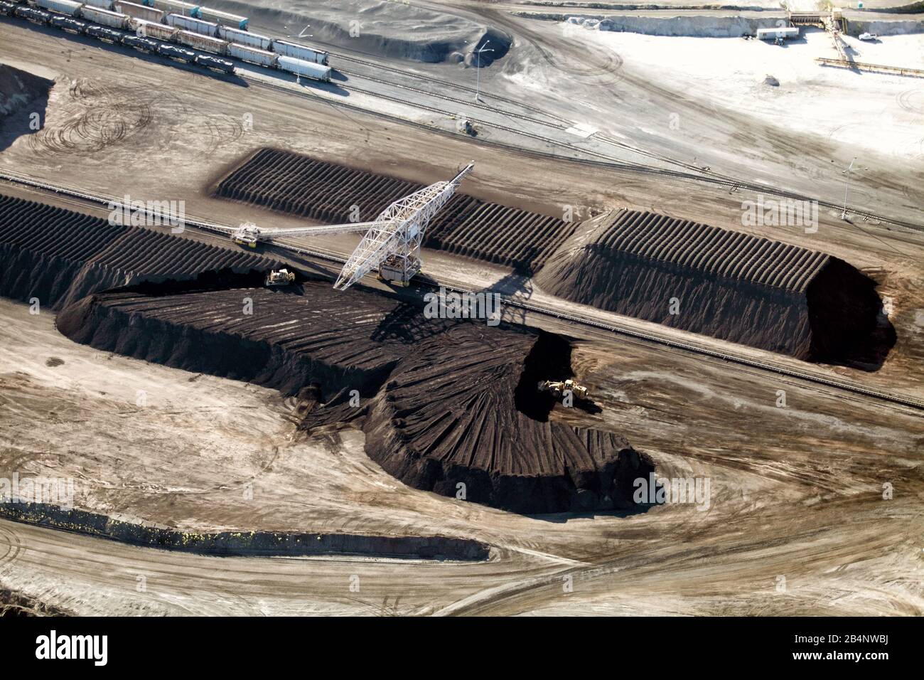 An aerial view of the piler making piles of phosphate ore at the Monsanto phosphate mine processing facility near Soda Springs Idaho. Stock Photo