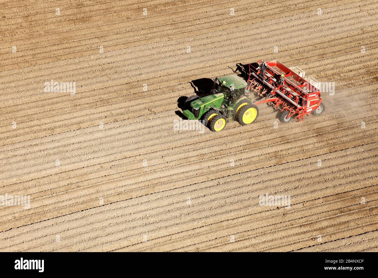 American Falls, Idaho, USA Apr. 17, 2015 An aerial view of farm machinery planting potatoes in the fertile farm fields of Idaho. Stock Photo