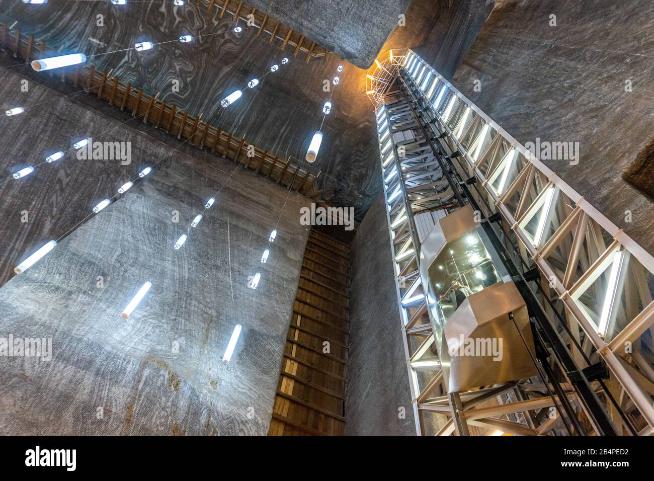 SALINA TURDA, ROMANIA - DEC 22, 2019: Rudolf mine panoramic elevator that offers tourists an overview of the whole mine in Romania. Salina Turda illus Stock Photo