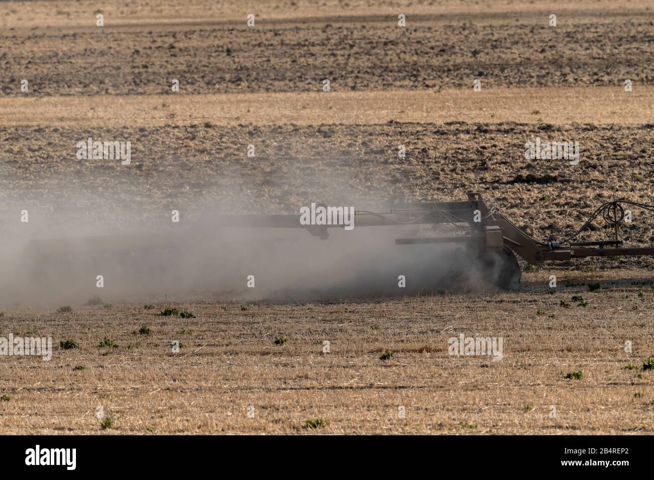 Soil erosion from large-scale harrowing in arable field, California. Stock Photo