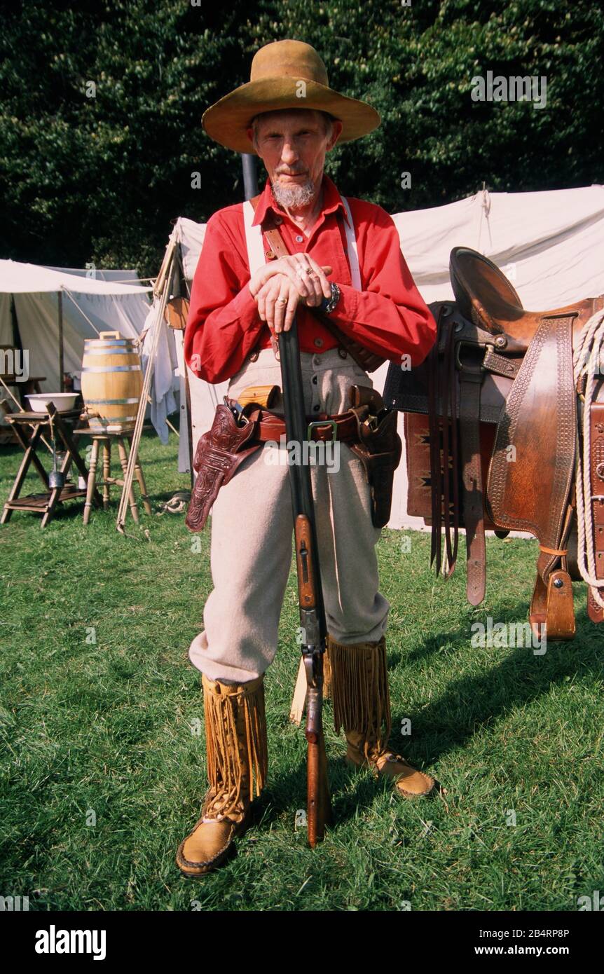 Texican Reenactor holding a Shotgun and Pistols 1889 a member of the Spearfish Creek Re-enactment Society. Stock Photo