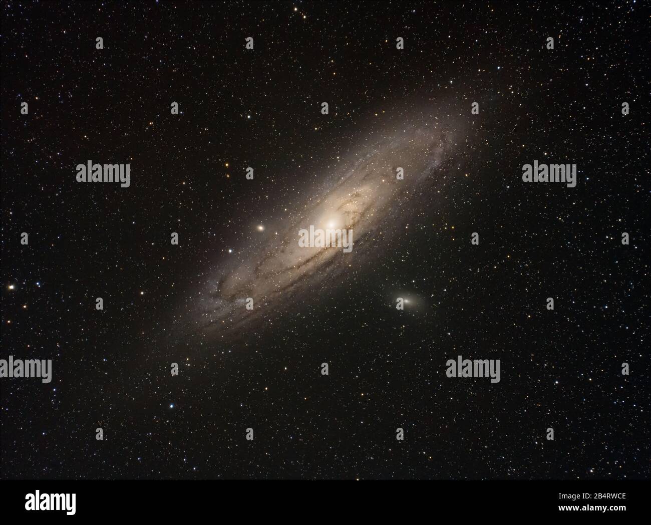 Andromeda galaxy with sattelite, shot with personal telescope Stock Photo Alamy
