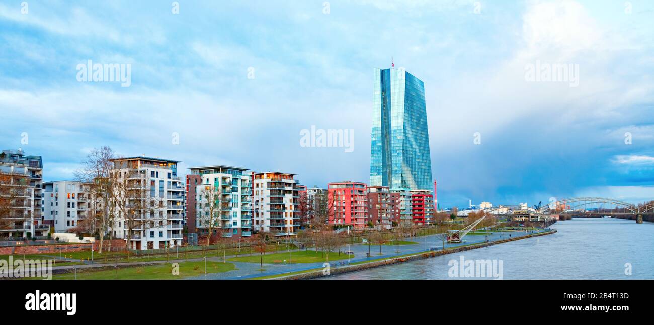 Panoramic view with European Central Bank (ECB) headquarters building and residential buildings along the river Main. Frankfurt am Main, Germany. Stock Photo