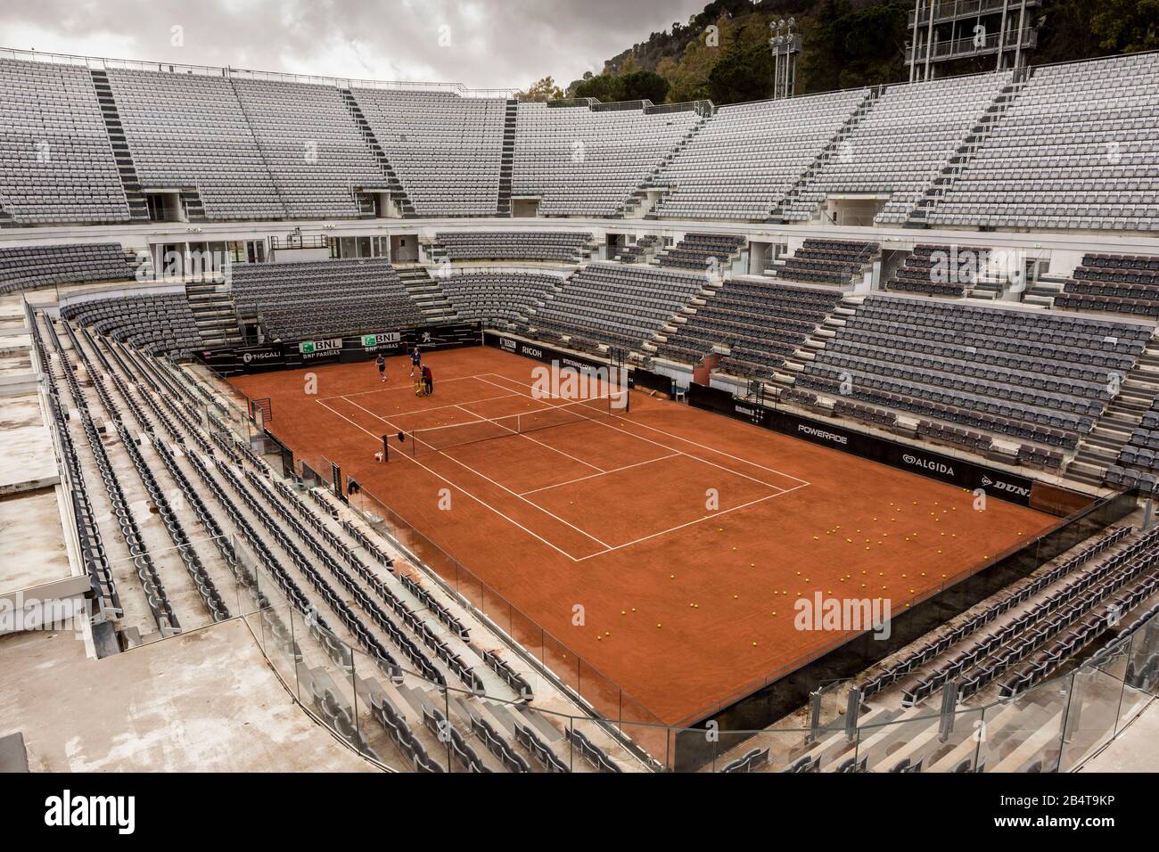 Rome Tennis Stadium. Two tennis players practice with their trainer in an  empty Rome Tennis Stadium (Stadio del Tennis di Roma Stock Photo - Alamy