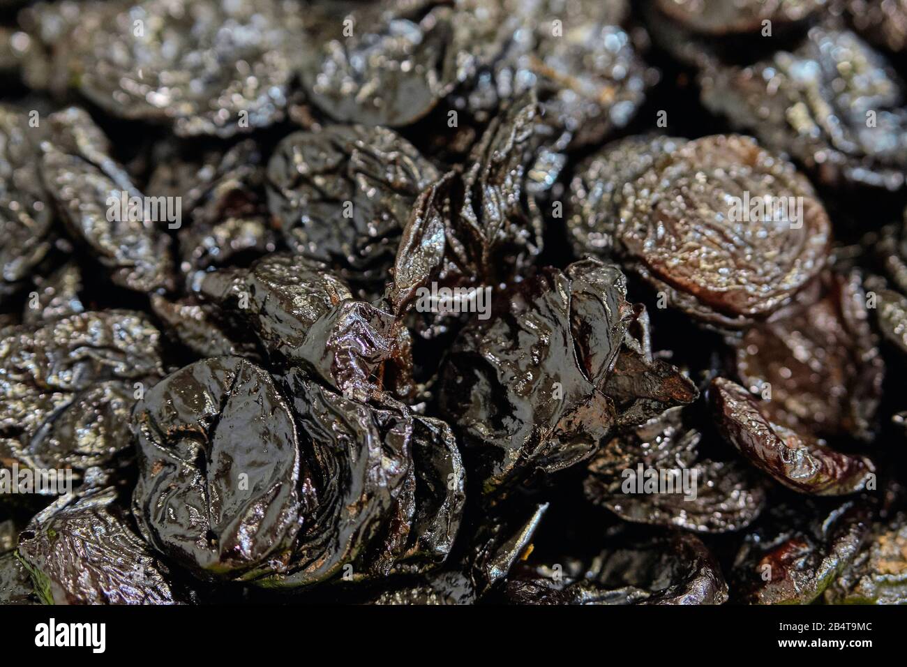 Background and texture of prunes. Close up. Stock Photo