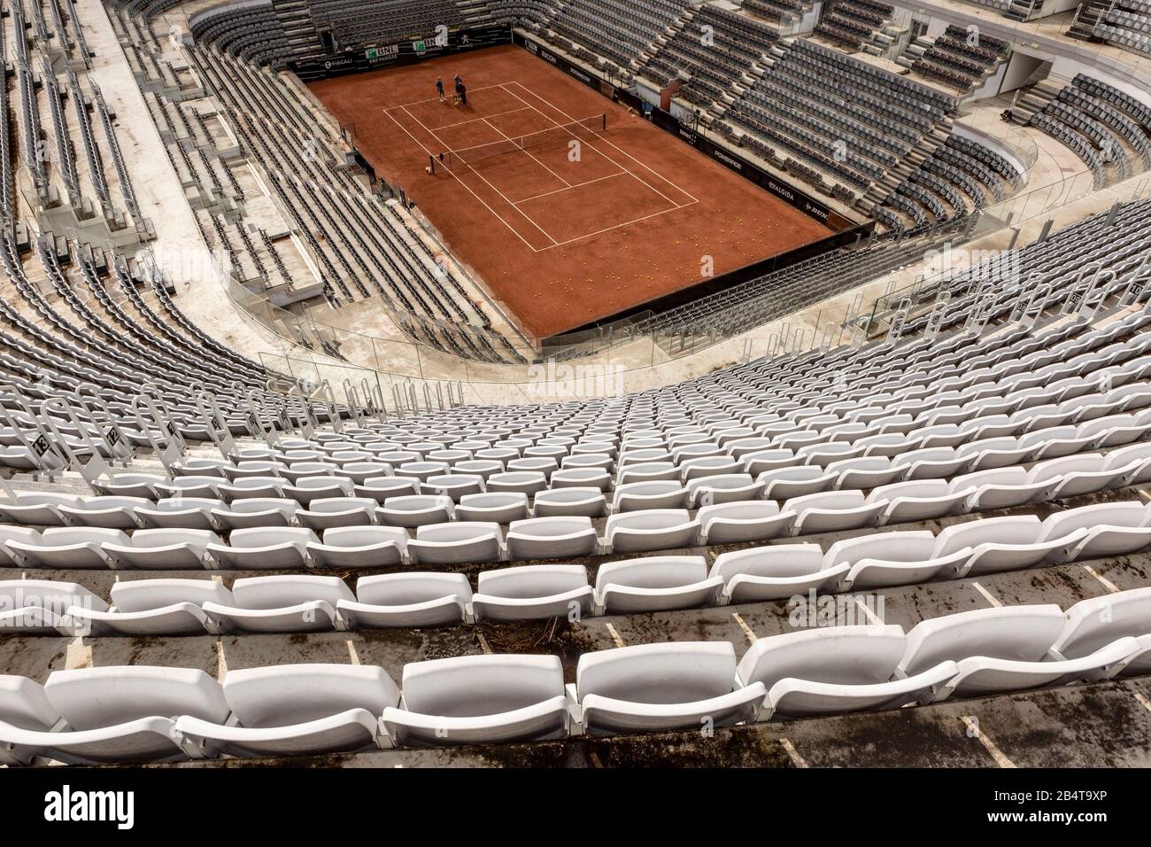 Rome Tennis Stadium. Two tennis players practice with their trainer in an  empty Rome Tennis Stadium (Stadio del Tennis di Roma Stock Photo - Alamy