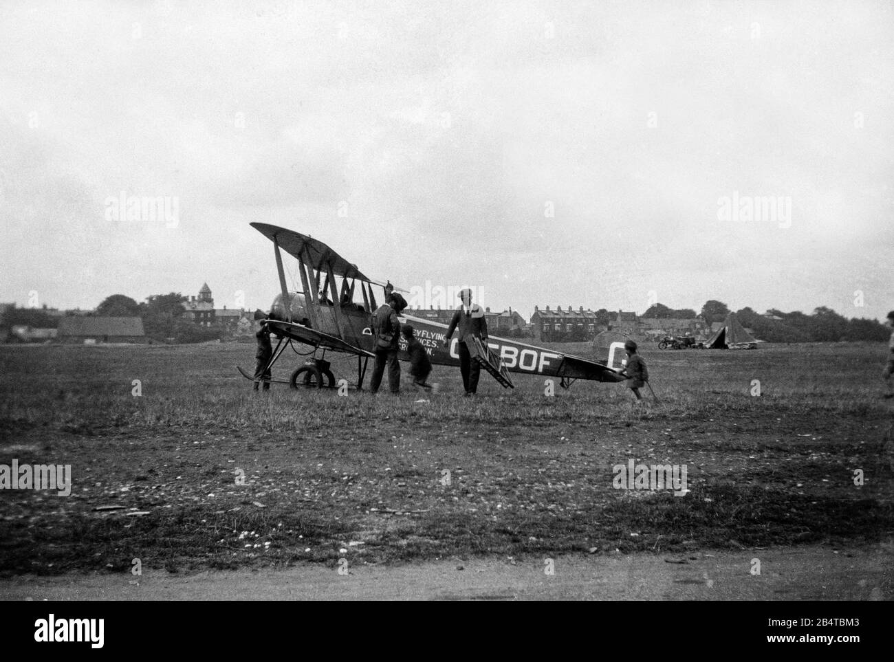 A vintage 1928 black and white photograph showing an Avro 536 Biplane, registration G-EBOF, belonging to Surrey Flying Services. Photograph taken at Croydon. This aeroplane was used mainly for pleasure flights between 1926 and 1929. Stock Photo