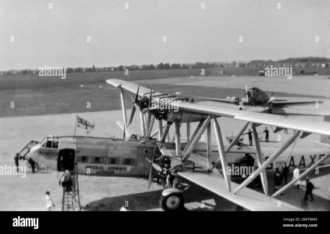 A vintage black and white photograph showing an Imperial Airways Handley Page, HP. 42 Airliner, registration G-AAXE, and named Hengist, at Oxford Aerodrome, Airport, in 1933. Stock Photo