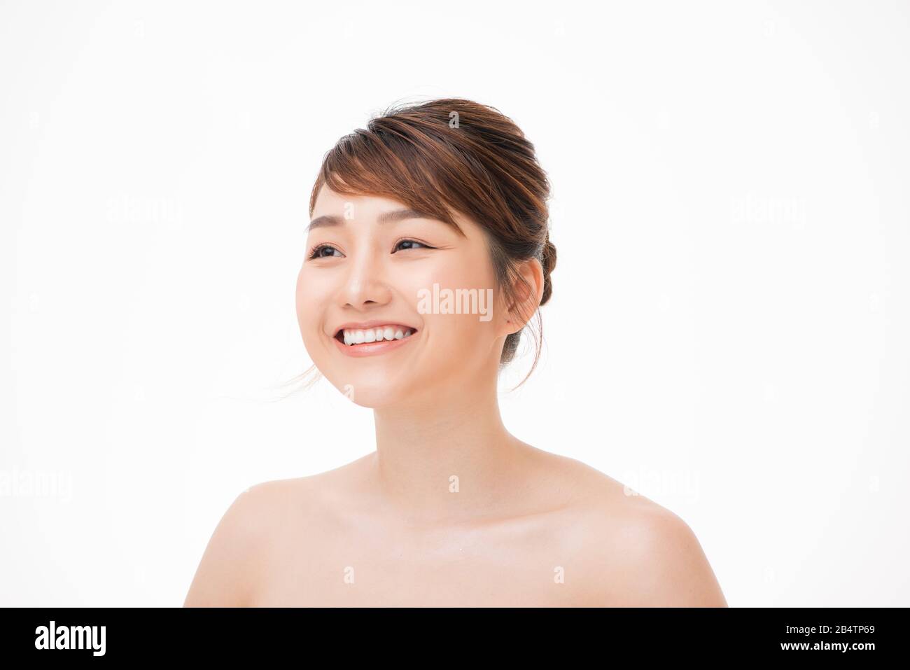 Girl beauty face care. Facial treatment. Cosmetology, beauty and spa. Stock Photo