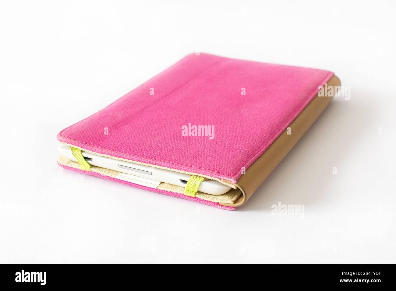 E-book reader in pink case on white background Stock Photo