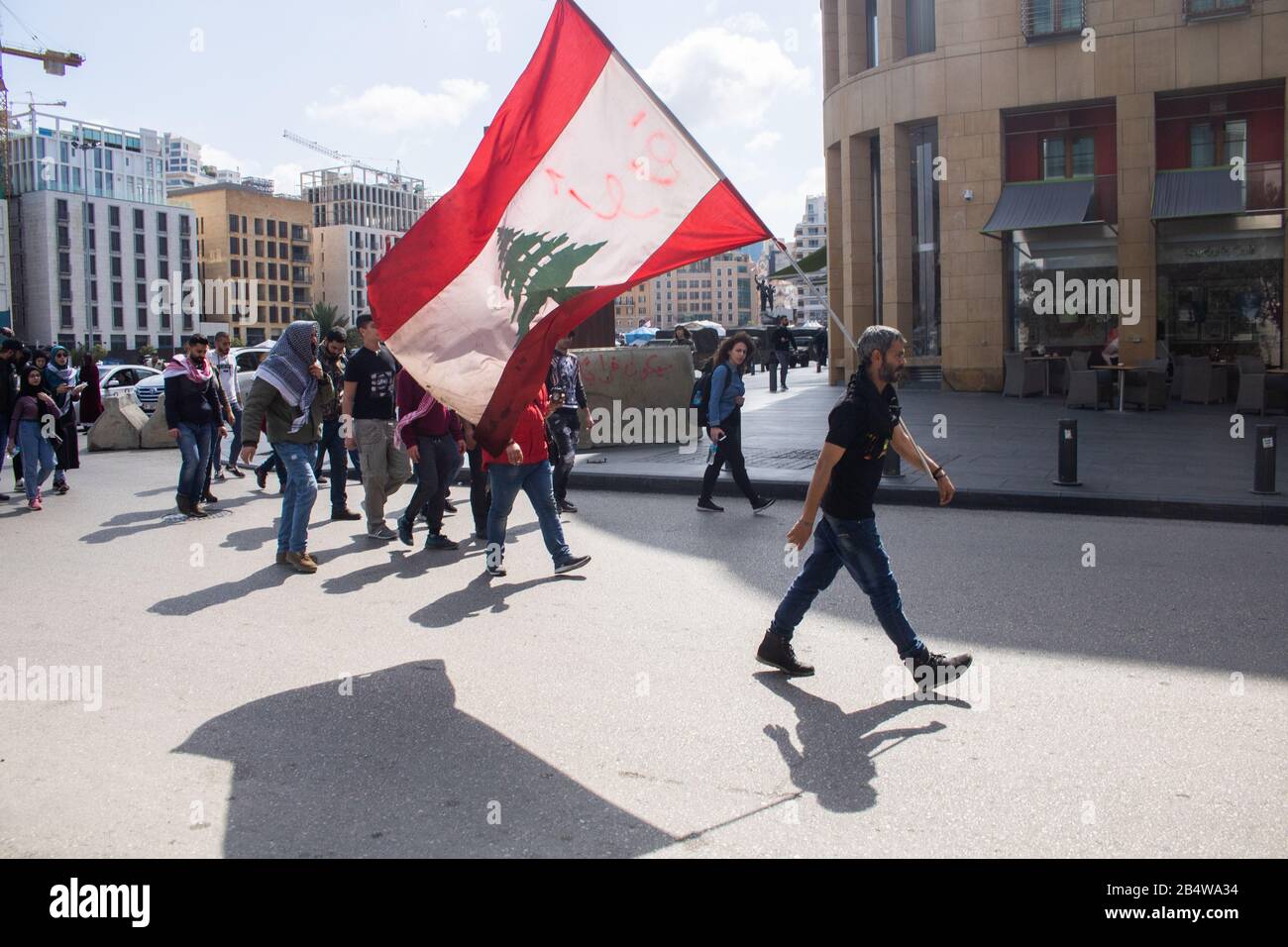 Beirut, Lebanon. 7 March 2020:  Anti government protesters march in downtown Beirut  as they campaign against government. corruption and economic paralysis . Lebanon is facing economic and financial strains, sparking protests  against a ruling elite accused of plunging the country into crisis Credit: amer ghazzal/Alamy Live News Stock Photo