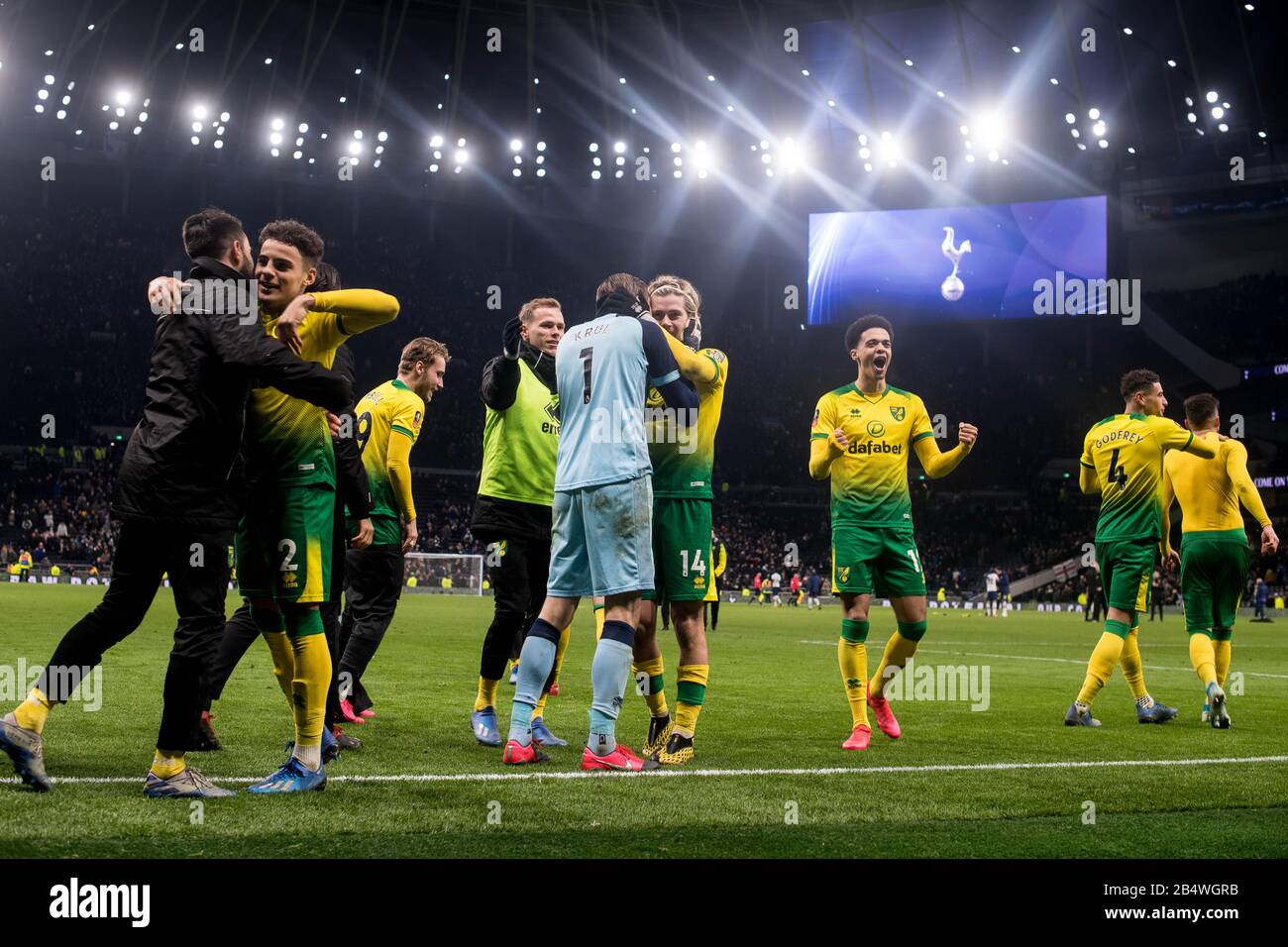 LONDON, ENGLAND - MARCH 04: Tim Krul, Adam Idah, Max Aarons, Grant Hanley, Jamal Lewis, Marco Stiepermann of Norwich City  celebrates after win penalt Stock Photo