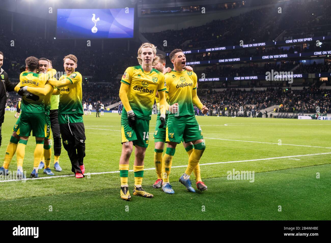 LONDON, ENGLAND - MARCH 04: Tim Krul, Adam Idah, Max Aarons, Grant Hanley, Jamal Lewis, Marco Stiepermann of Norwich City  celebrates after win penalt Stock Photo