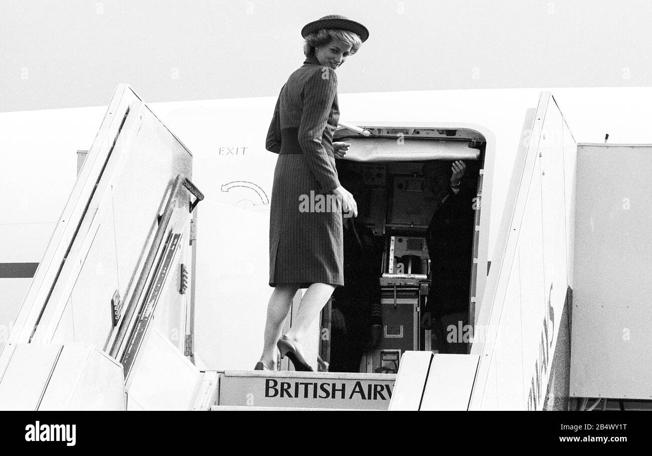 Diana Princess of Wales leaving London's Heathrow Airport by Concorde to Vienna in April 1986. She was escorted to the flight by British Airways Chairman Lord King and Sir Norman Payne Chairman of the British Airports Authority. Stock Photo