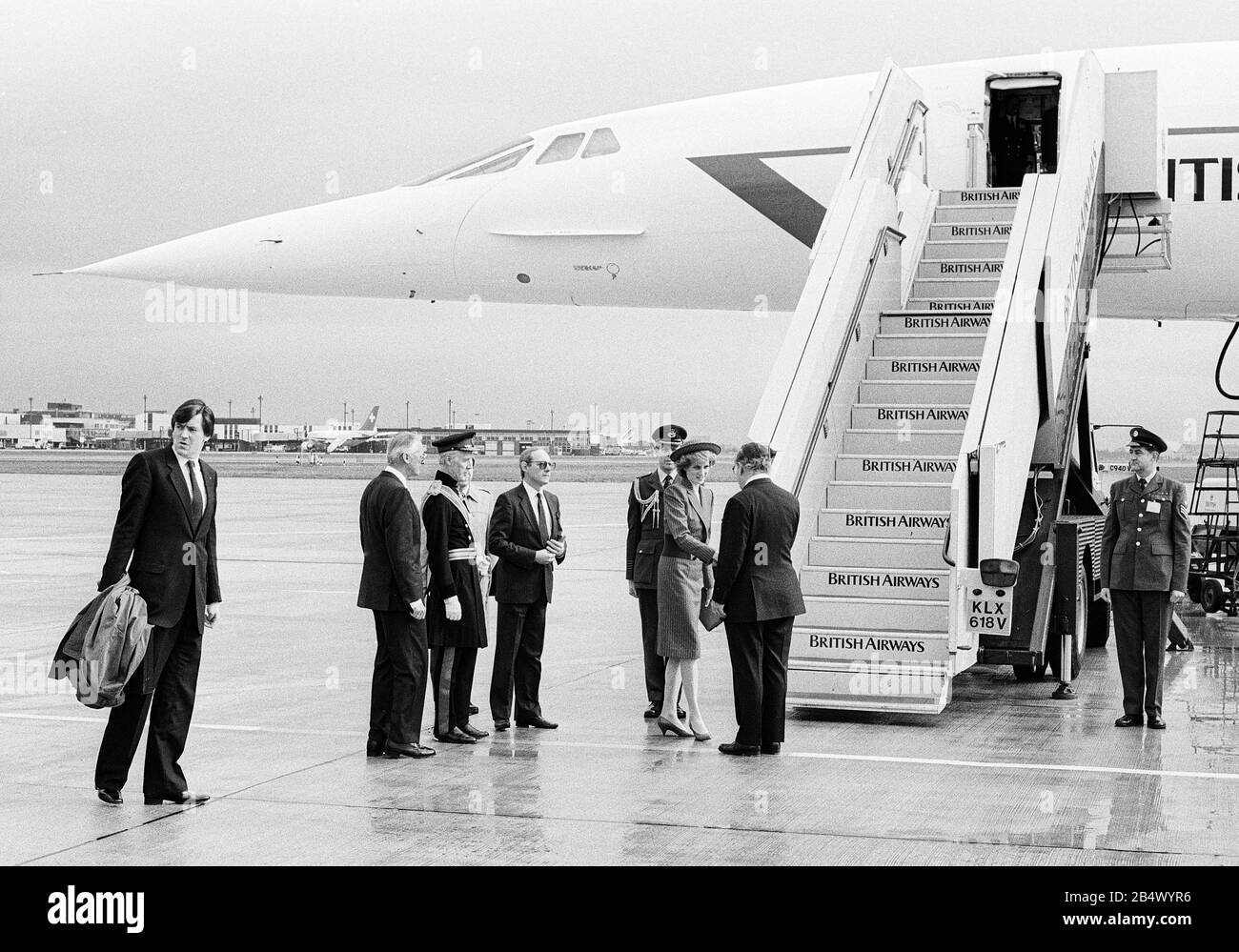 Diana Princess of Wales leaving London's Heathrow Airport by Concorde to Vienna in April 1986. She was escorted to the flight by British Airways Chairman Lord King and Sir Norman Payne Chairman of the British Airports Authority. Stock Photo