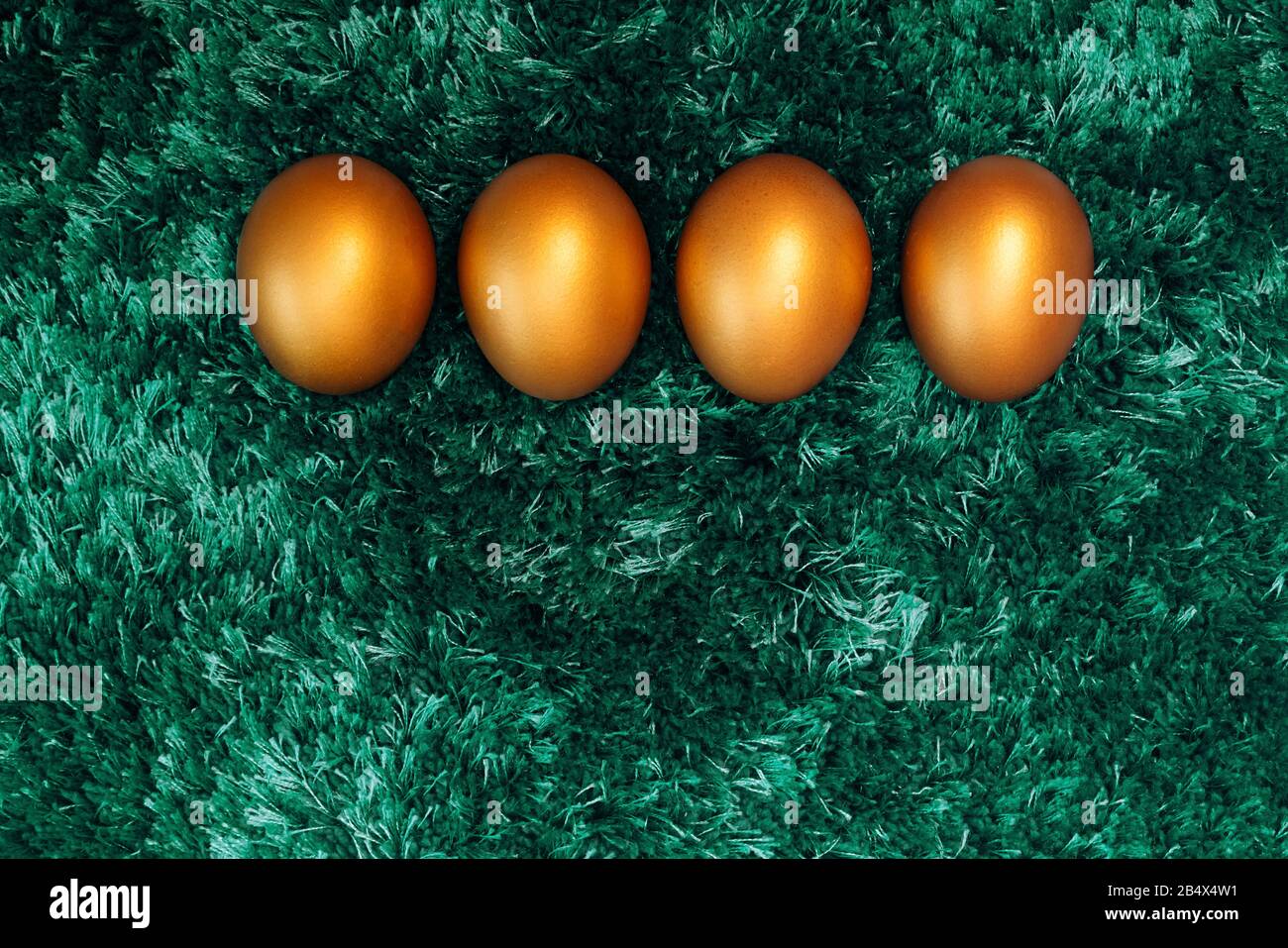 Golden Easter egg, happy Easter sunday hunt holiday decorations Stock Photo