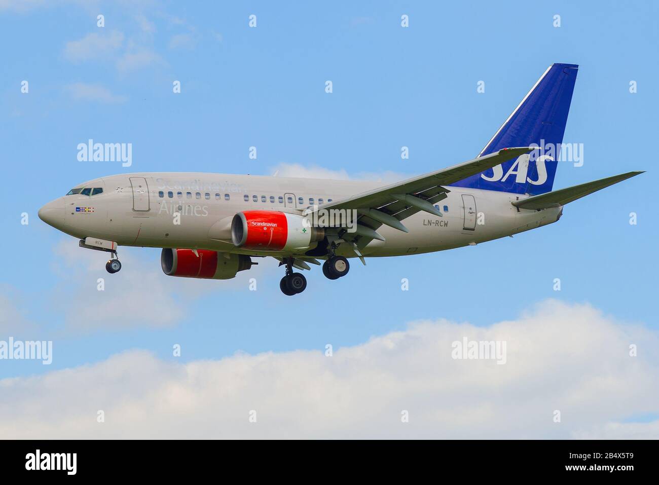ST. PETERSBURG, RUSSIA - MAY 17, 2016: Scandinavian Air System airline Boeing 737-683 (LN-RCW) on the glide path Stock Photo