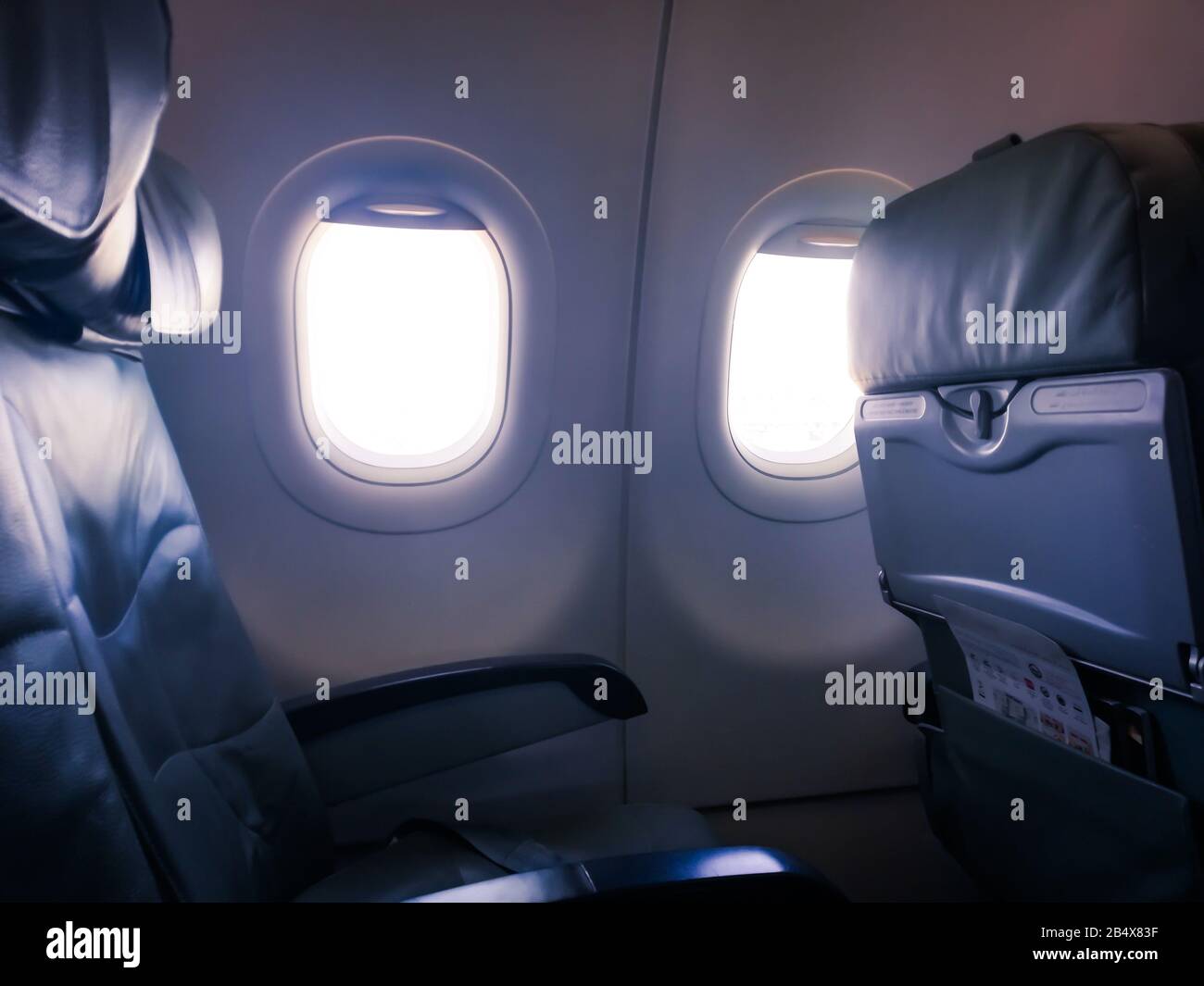 Booking airline Ticket Airplane window seat showing clouds and wing Stock Photo Alamy