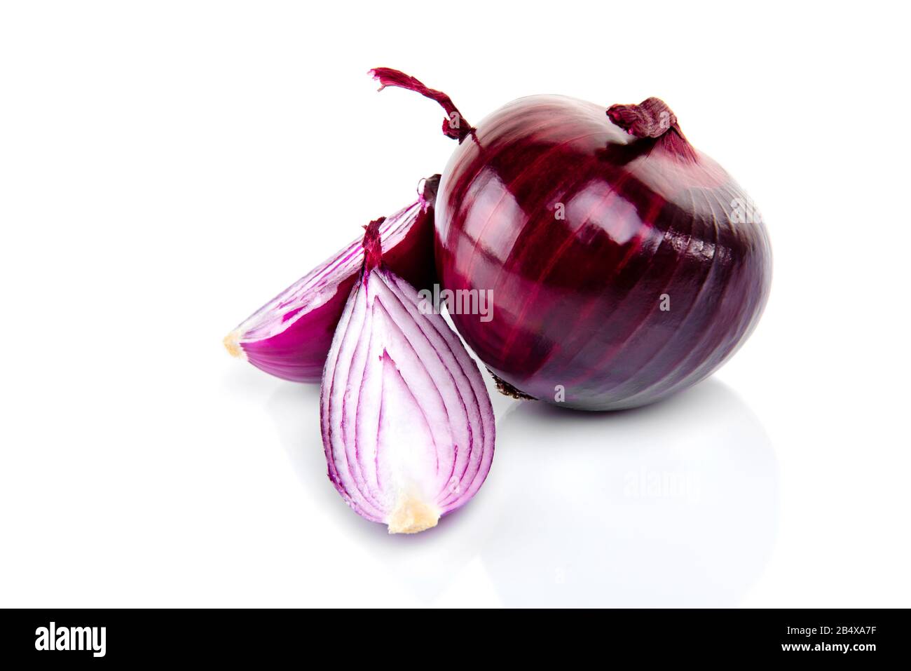 Red onion and half slice on white isolated background with reflect ...