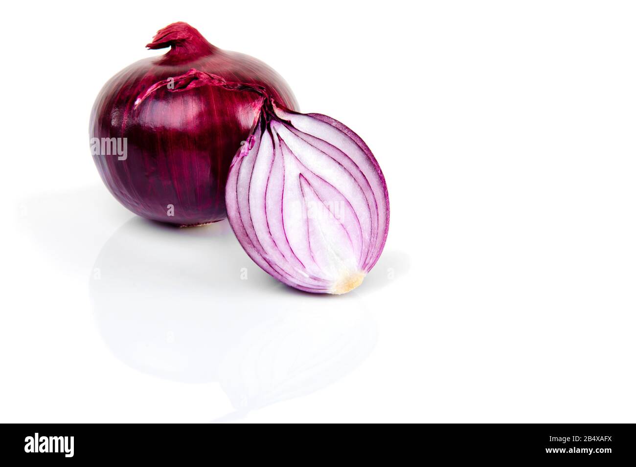 Red onion and half slice on white isolated background with reflect ...