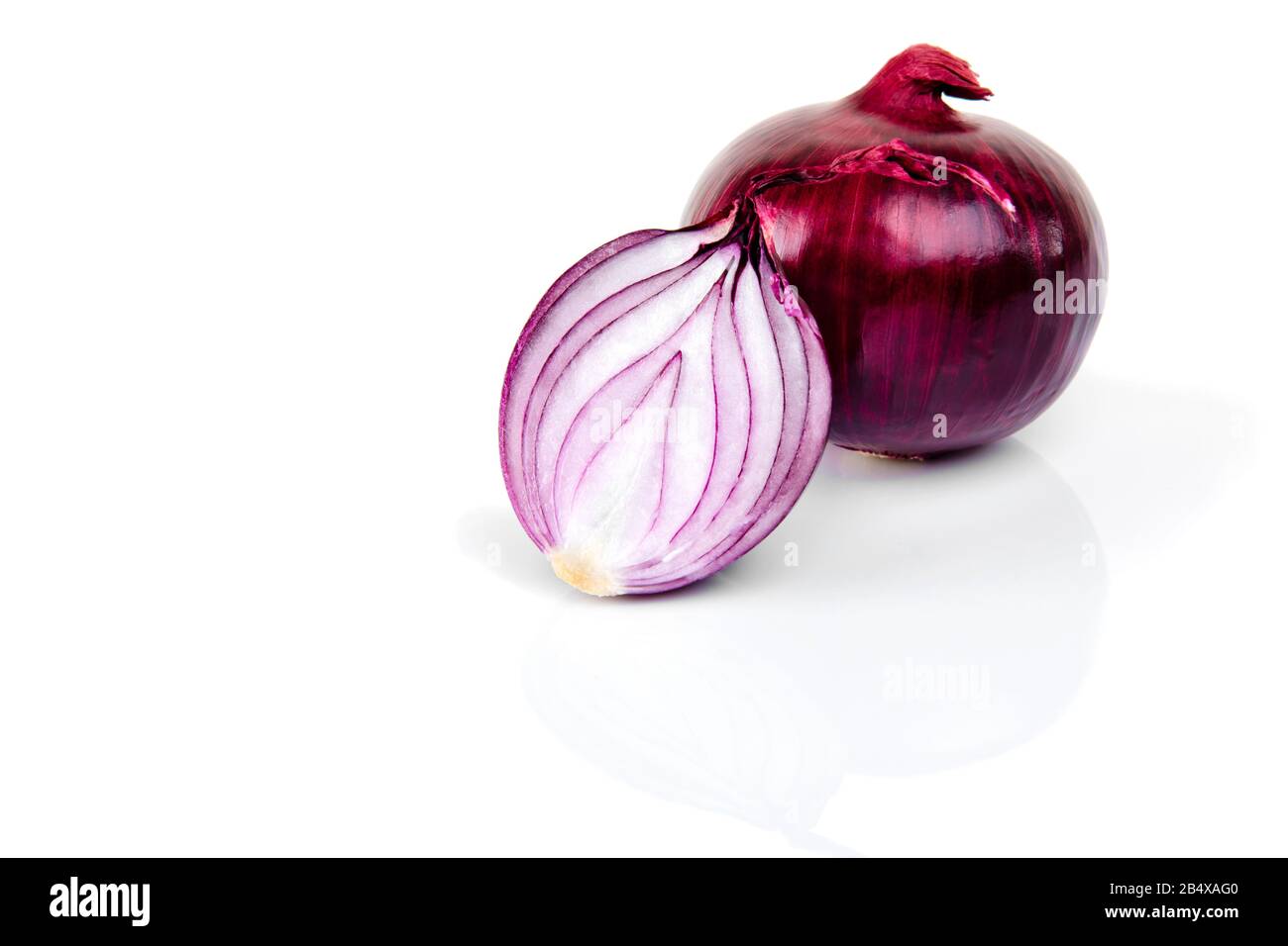 Red onion and half slice on white isolated background with reflect ...