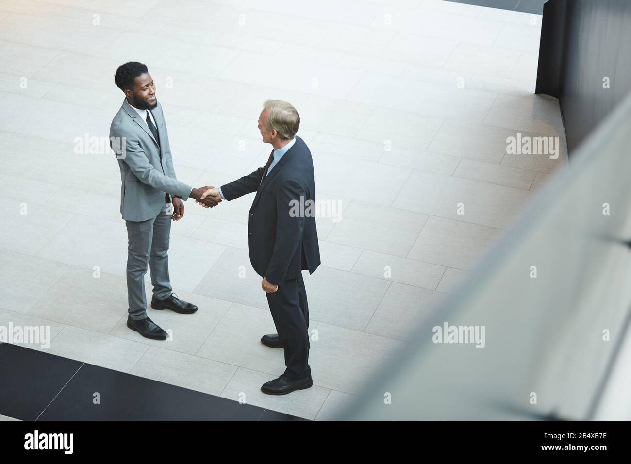 Group of businessmen suits hi-res stock photography and images - Alamy