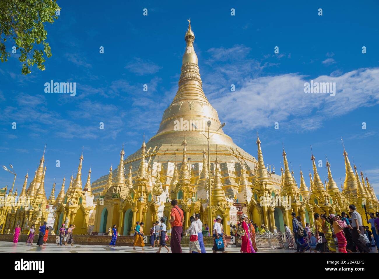 YANGON, MYANMAR - DECEMBER 17, 2016: View of the golden stupa of the Shwedagon Pagoda on a sunny day Stock Photo