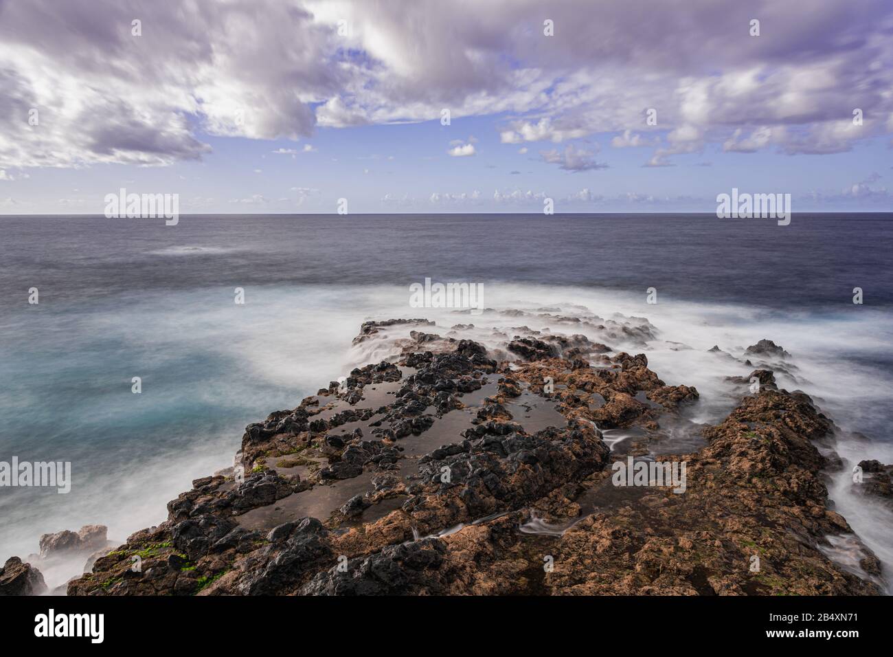 El Pris volcanic rocks, Atlantic ocean volcanic seascape, long exposure  photography, Tacoronte, Tenerife, Canary islands, Spain Stock Photo - Alamy