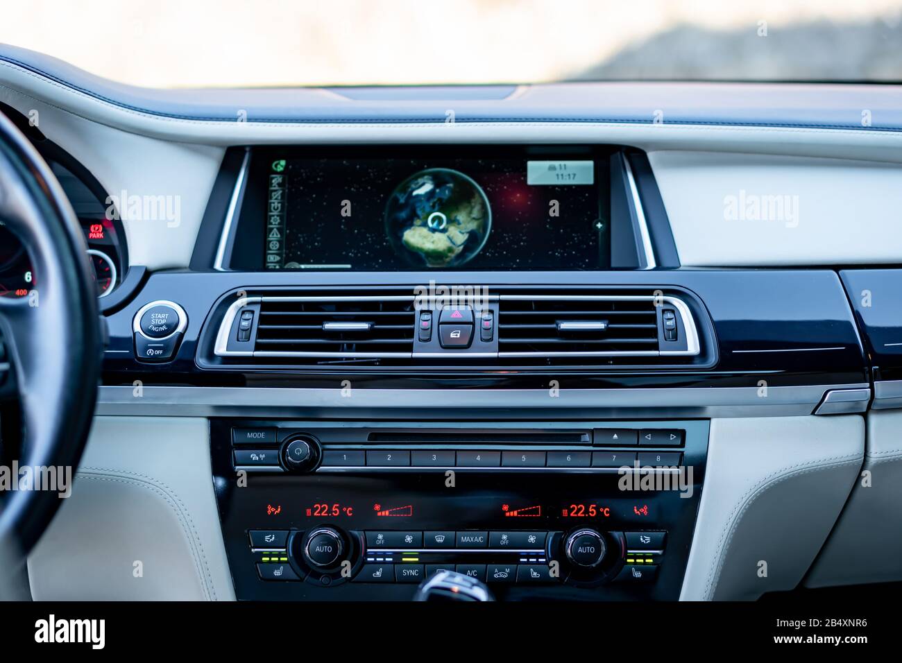 Bmw 750d climate unit and automatic gear knob, close up photo, heated seats  button, ventilated seats switch, digital temperature illustration Stock  Photo - Alamy