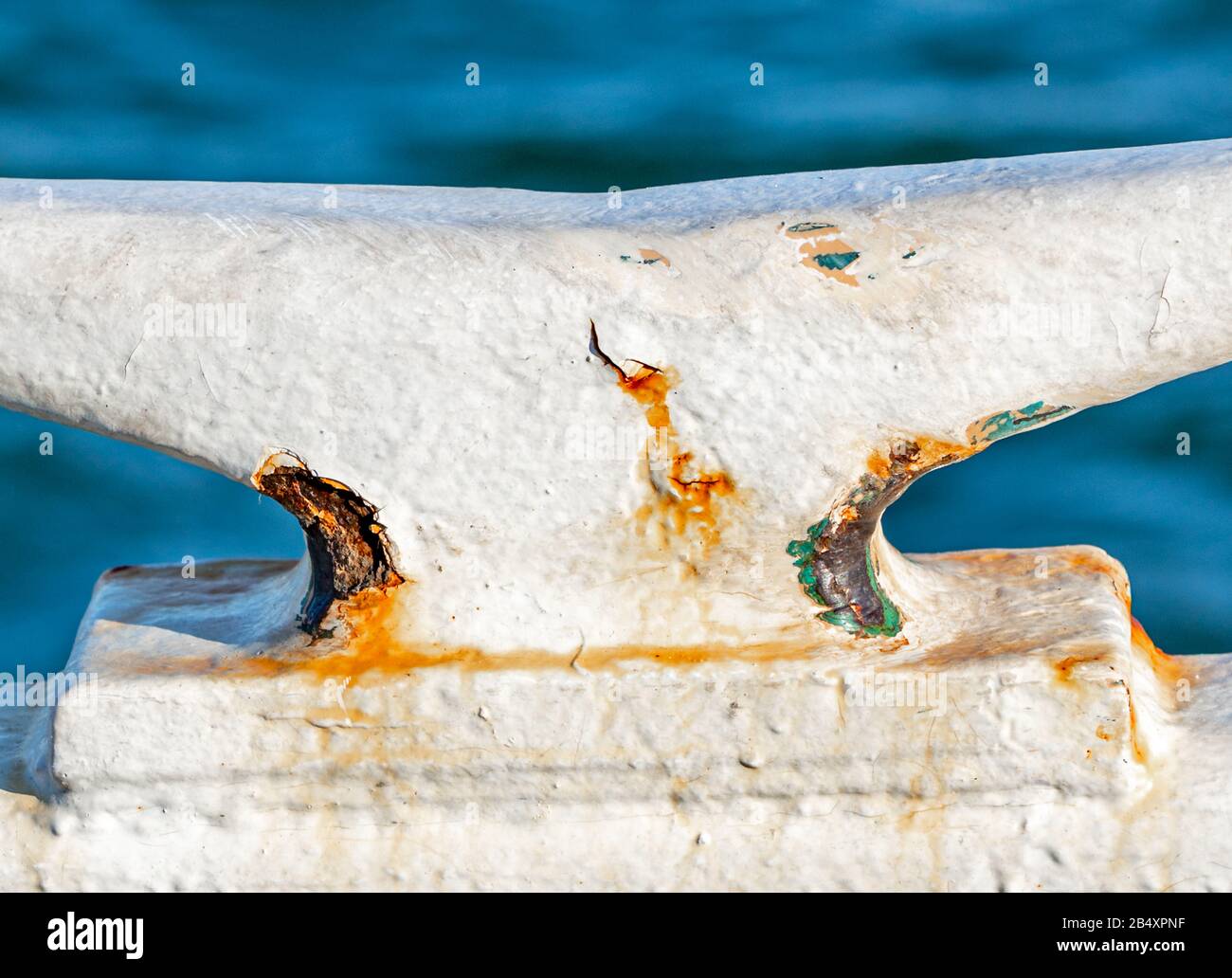 Large white metal cleat on a boat Stock Photo Alamy