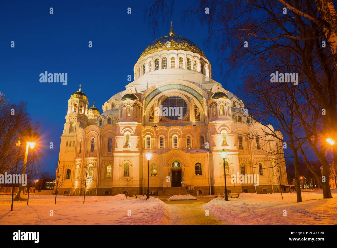 St. Nicholas Naval Cathedral in warm night lighting close-up. Kronstadt, Russia Stock Photo