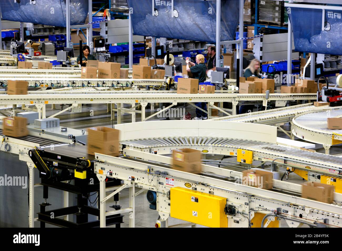 Package handling conveyors in a shipping facility Stock Photo Alamy