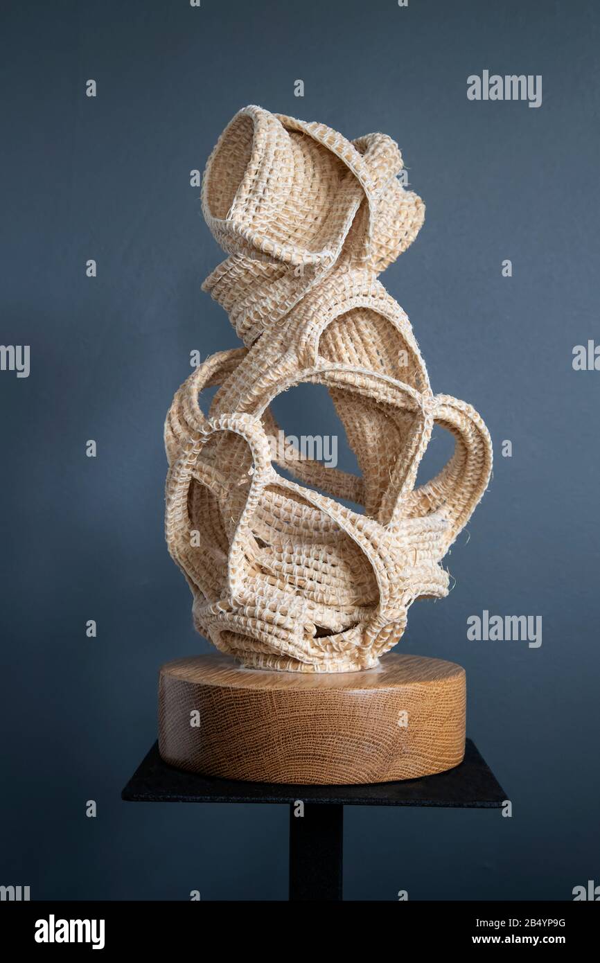 Textile sculpture employing crochet technique comprising sisal string and  spun crochet cotton on an oak base by artist Judy Tadman Stock Photo - Alamy
