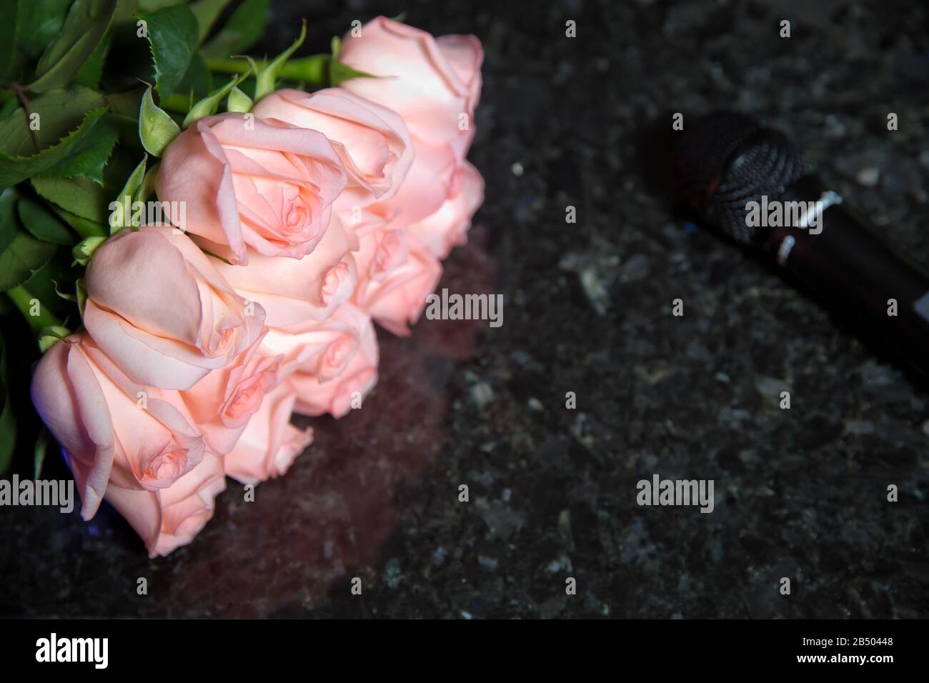 Background with violet ,pink roses on a black marble background Stock ...