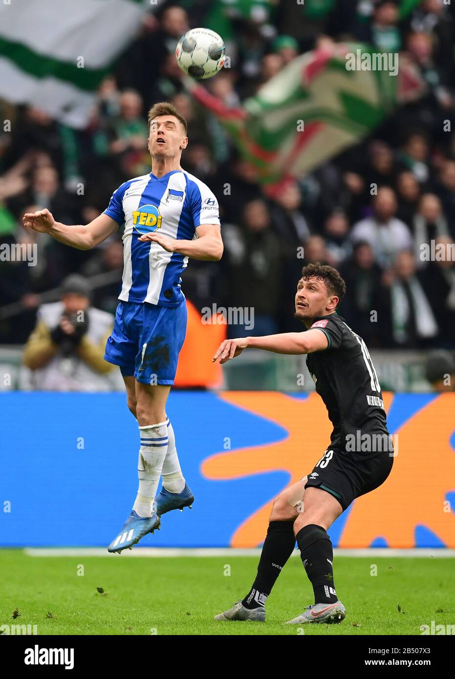 Berlin, Germany. 07th Mar, 2020. Football: Bundesliga, Hertha BSC - Werder  Bremen, 25th matchday in the Olympic Stadium. Krzysztof Piatek (l) of Hertha  against Milos Veljkovic of Bremen. Credit: Soeren  Stache/dpa-Zentralbild/dpa -