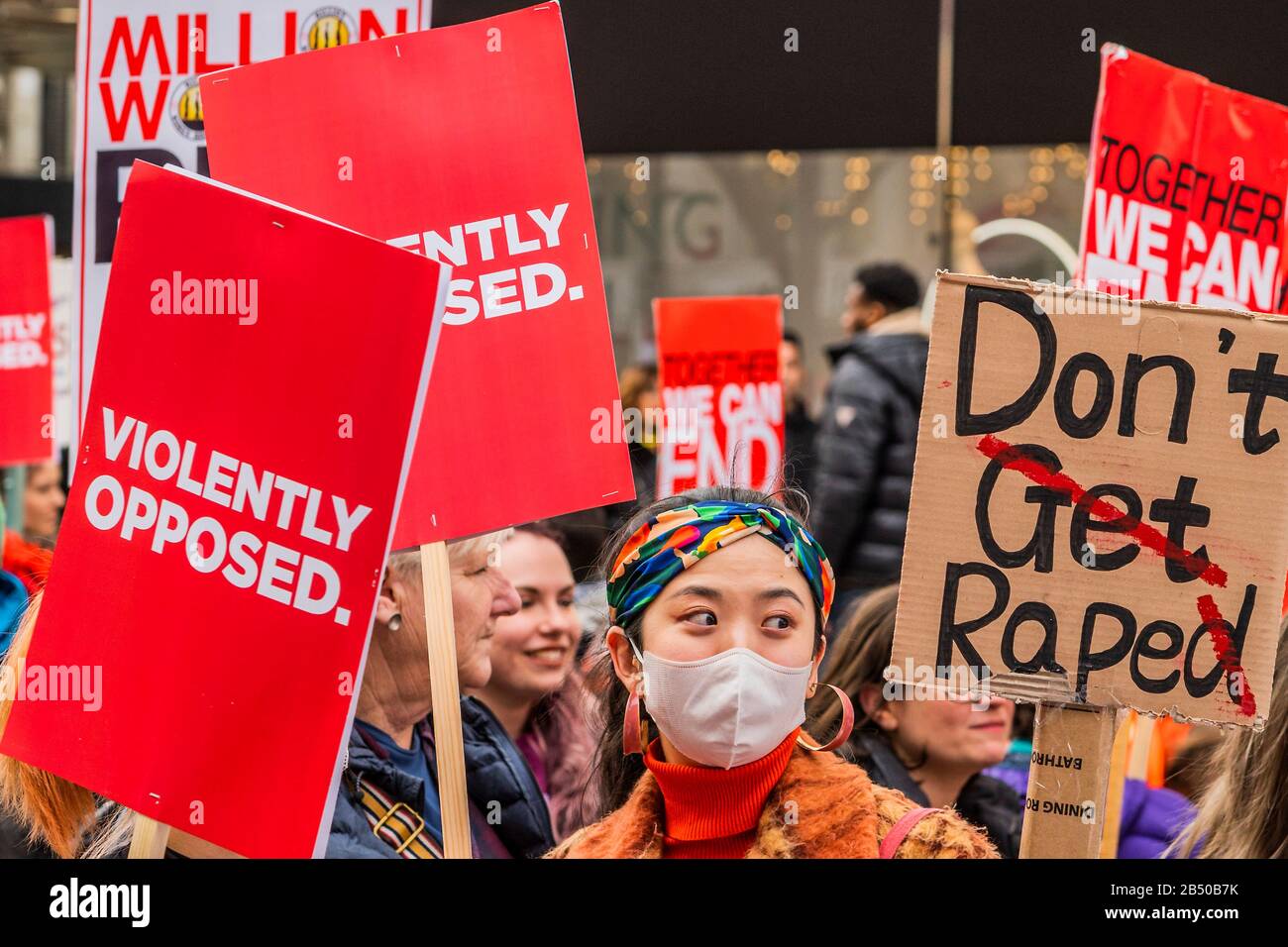 London, UK. 07th March 2020. Million Women Rise March to remember women and girls who have been killed. This year's themes were “Never Forgotten” & 'justice' - 'We will not be silenced! We will not be forgotten!'. Marchers were asked to wear something red - the colour of blood, 'the blood of our sisters who have been murdered and raped at the hands of male violence.' Credit: Guy Bell/Alamy Live News Stock Photo