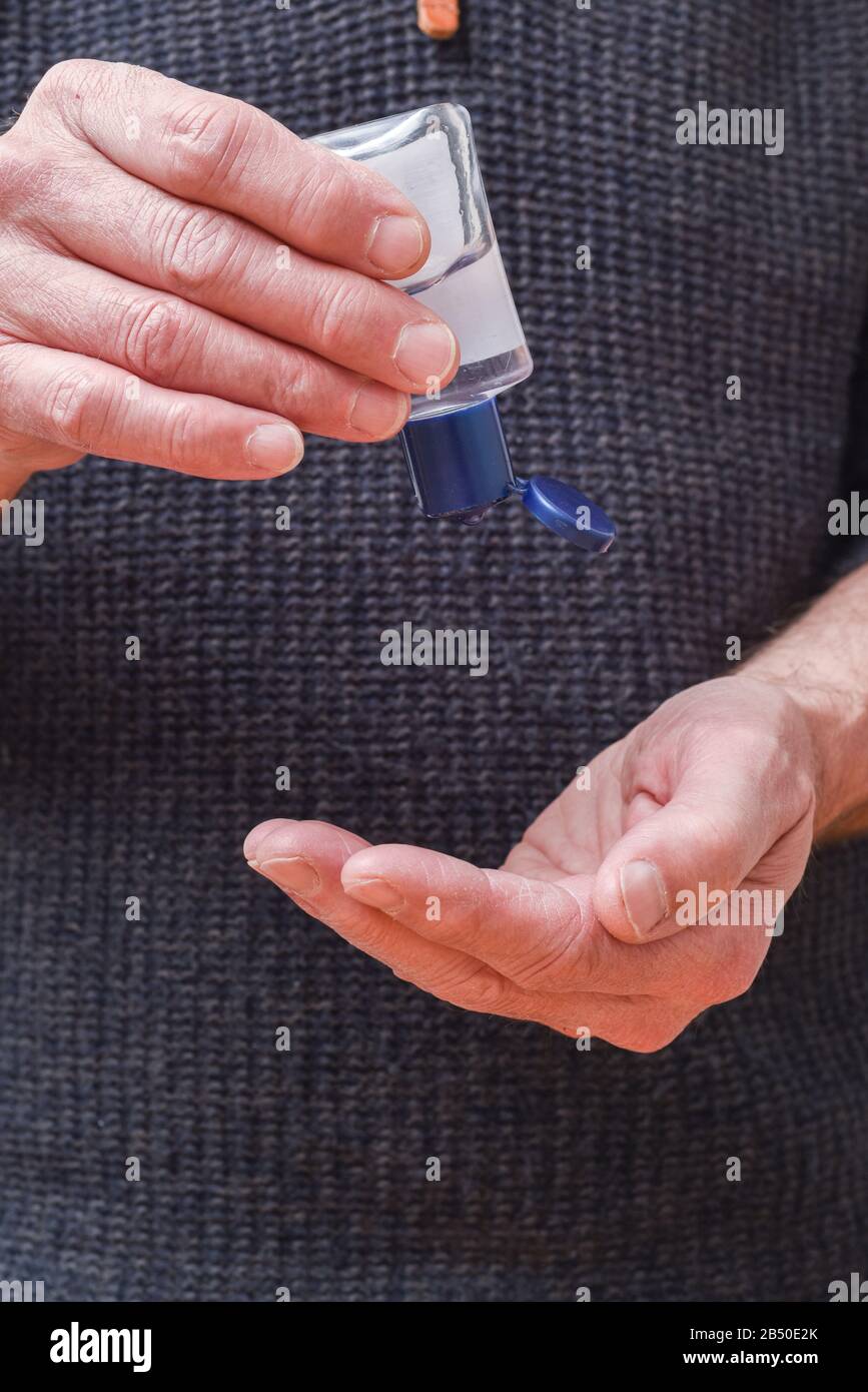 Person using antibacterial hand gel to kill gerns Stock Photo Alamy