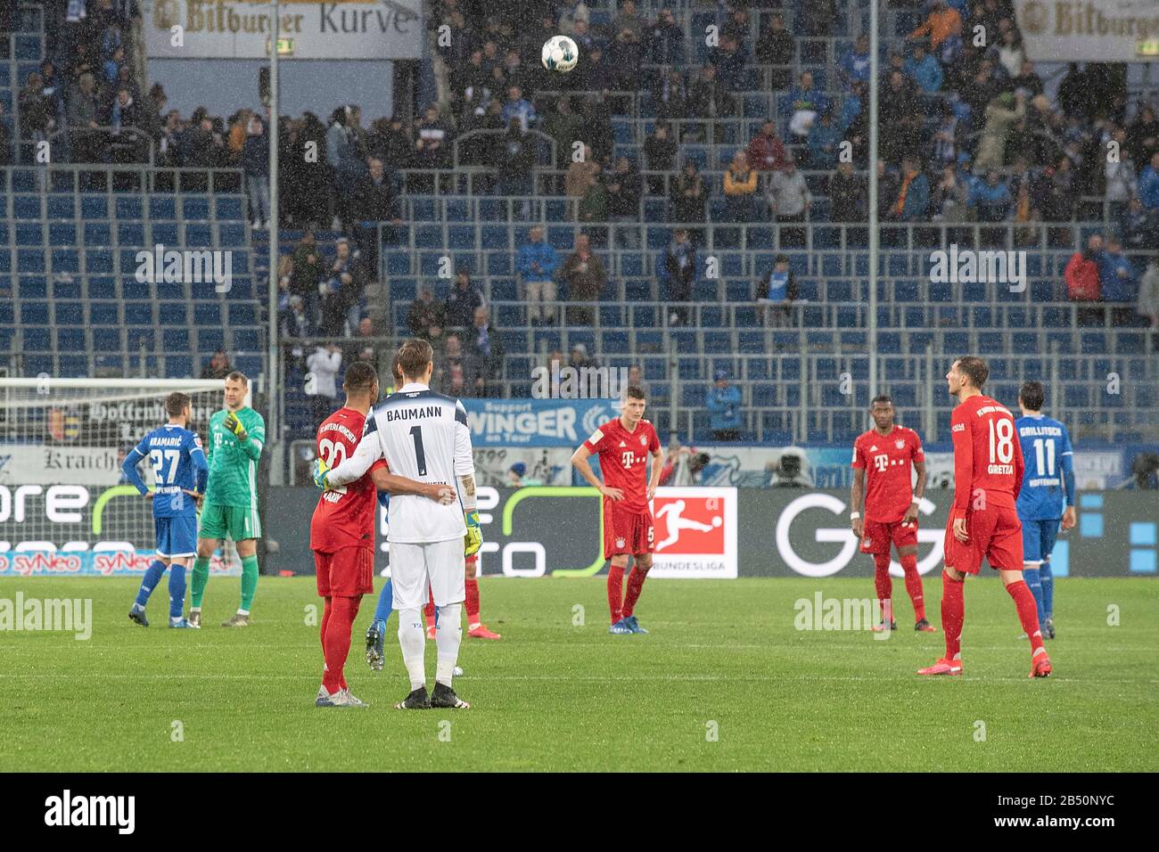 after the repeated posters, posters, banners, versus Hoffenheims Maezen (M? zen) Dietmar Hopp were shown in the fan block of the FC Bayern fans in the stands, the players decided a non-aggression pact for the remaining 13 minutes, Serge GNABRY (front left) M) and goalwart Oliver BAUMANN (1899) on friendly terms; Scandal, scandal; Insult; Soccer 1.Bundesliga, 24th matchday, matchday 24, TSG 1899 Hoffenheim (1899) - FC Bayern Munich (M) 0: 6, on 02/29/2020 in Sinsheim / Germany DFL REGULATIONS PROHIBIT ANY USE OF PHOTOGRAPHS AS IMAGE SEQUENCES AND / OR QUASI VIDEO. ? Sven Simon Fotoagentur GmbH Stock Photo
