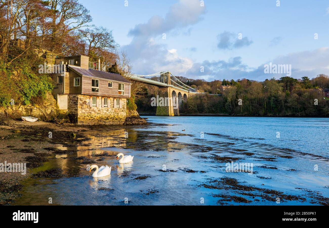 The Menai Bridge from the Belgian Promenade at Menai in Anglesey, Wales Stock Photo