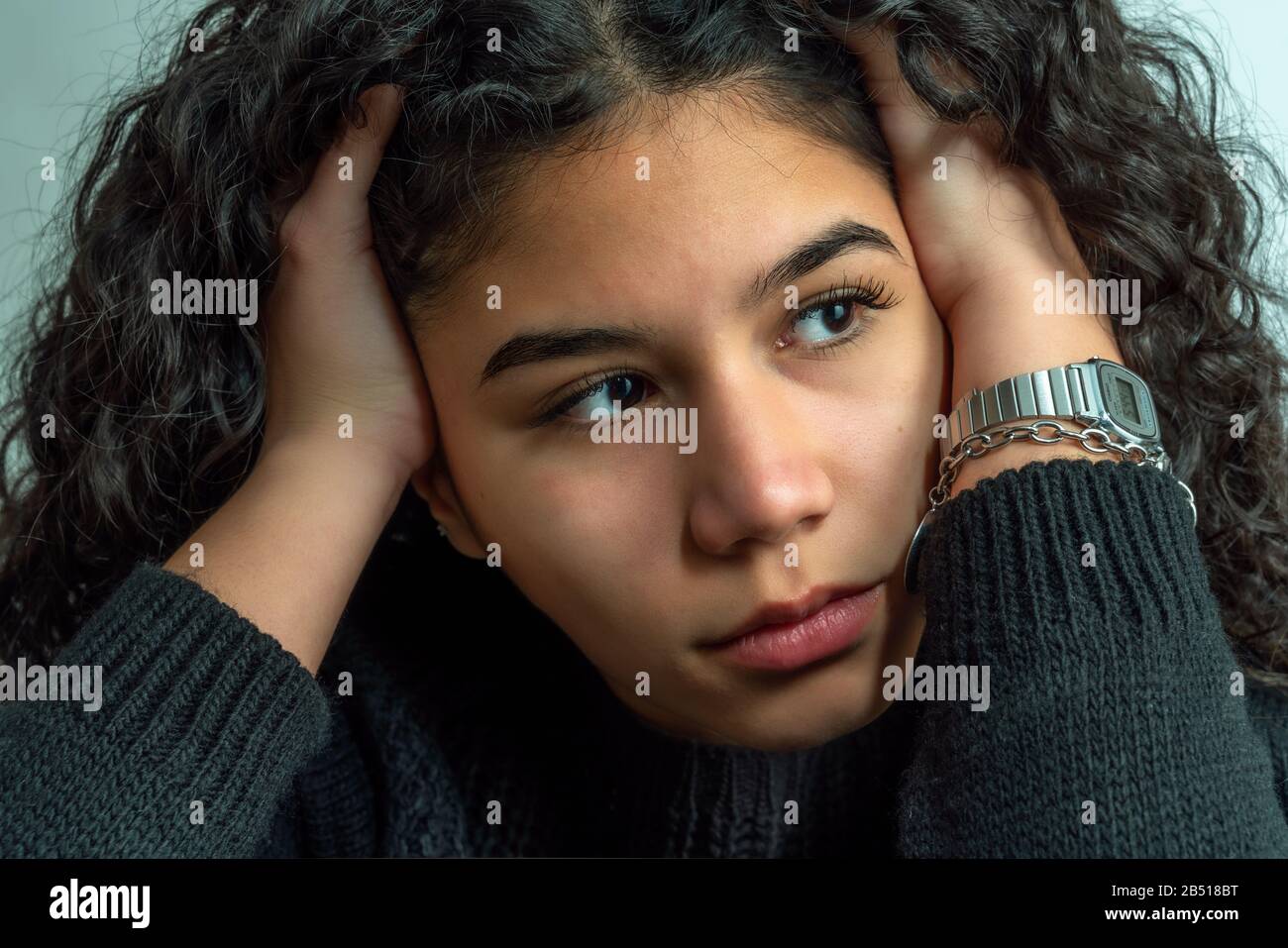 Teenager portrait closeup young woman pensively Stock Photo