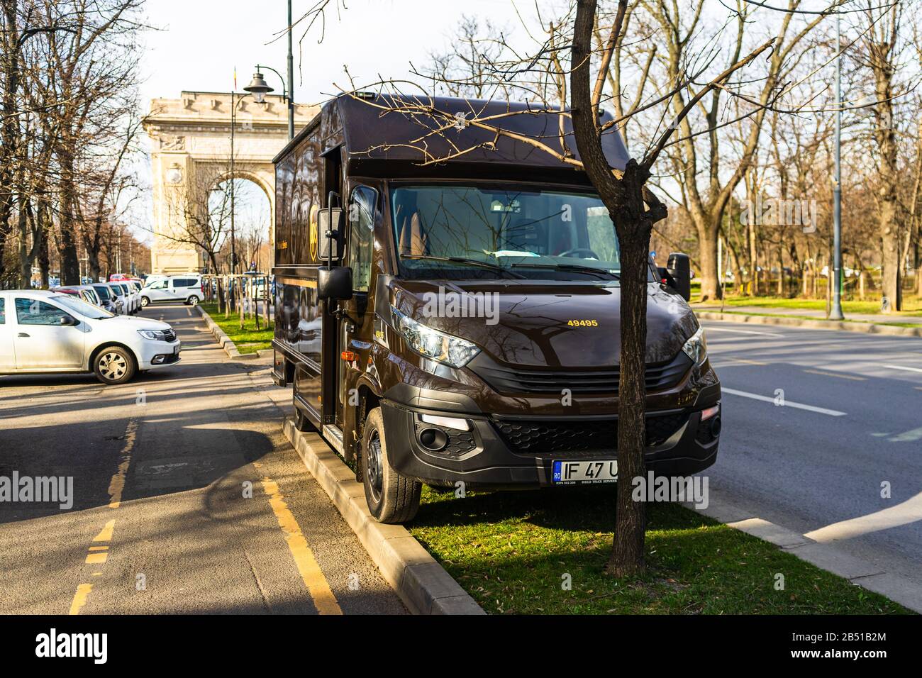 UPS truck parked on the sidewalk in Bucharest, Romania, 2020. UPS is