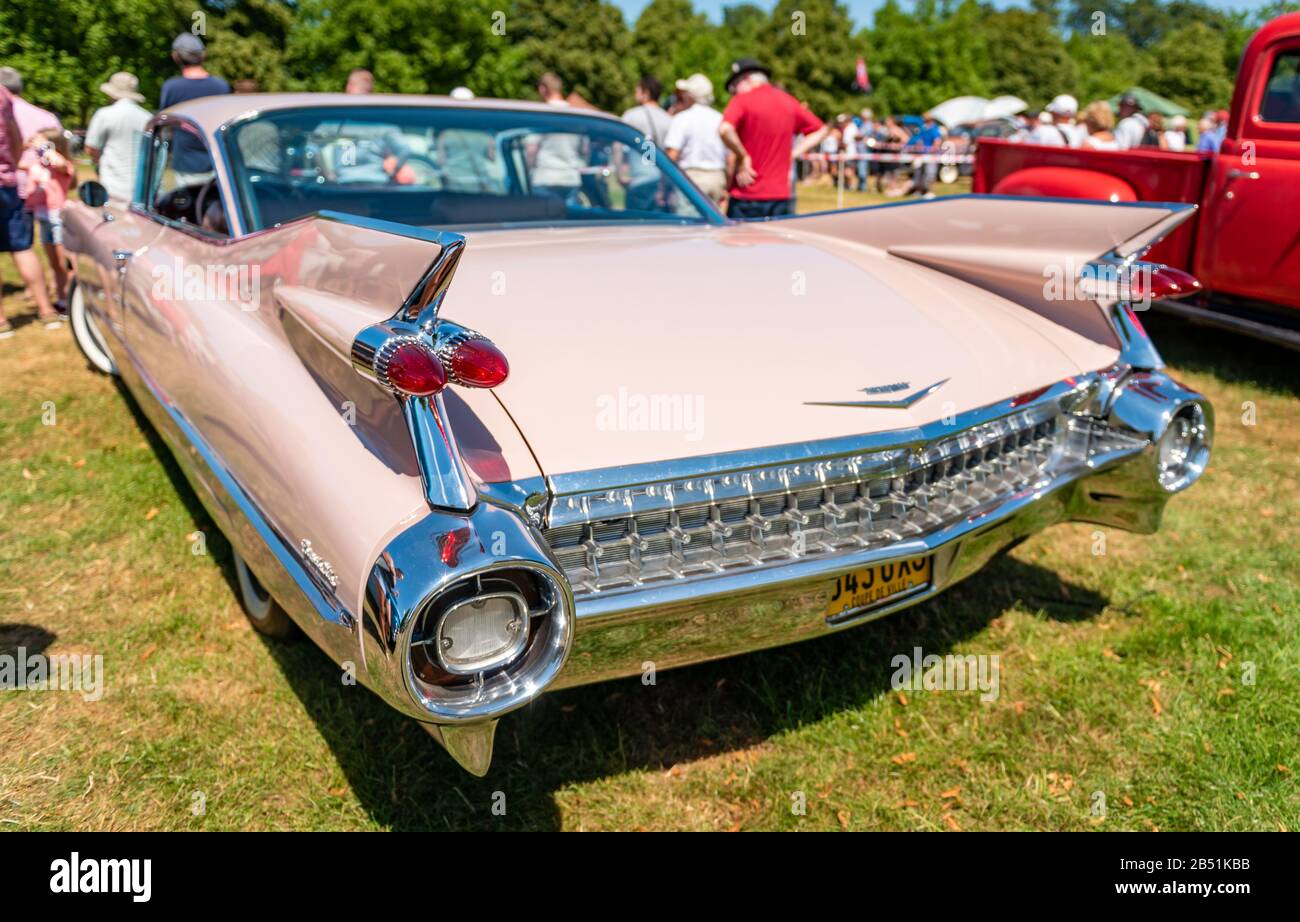 Pink Cadillac at The Rally of the Giants, classic American car show, in the grounds of Blenheim Palace, Woodstock. Stock Photo