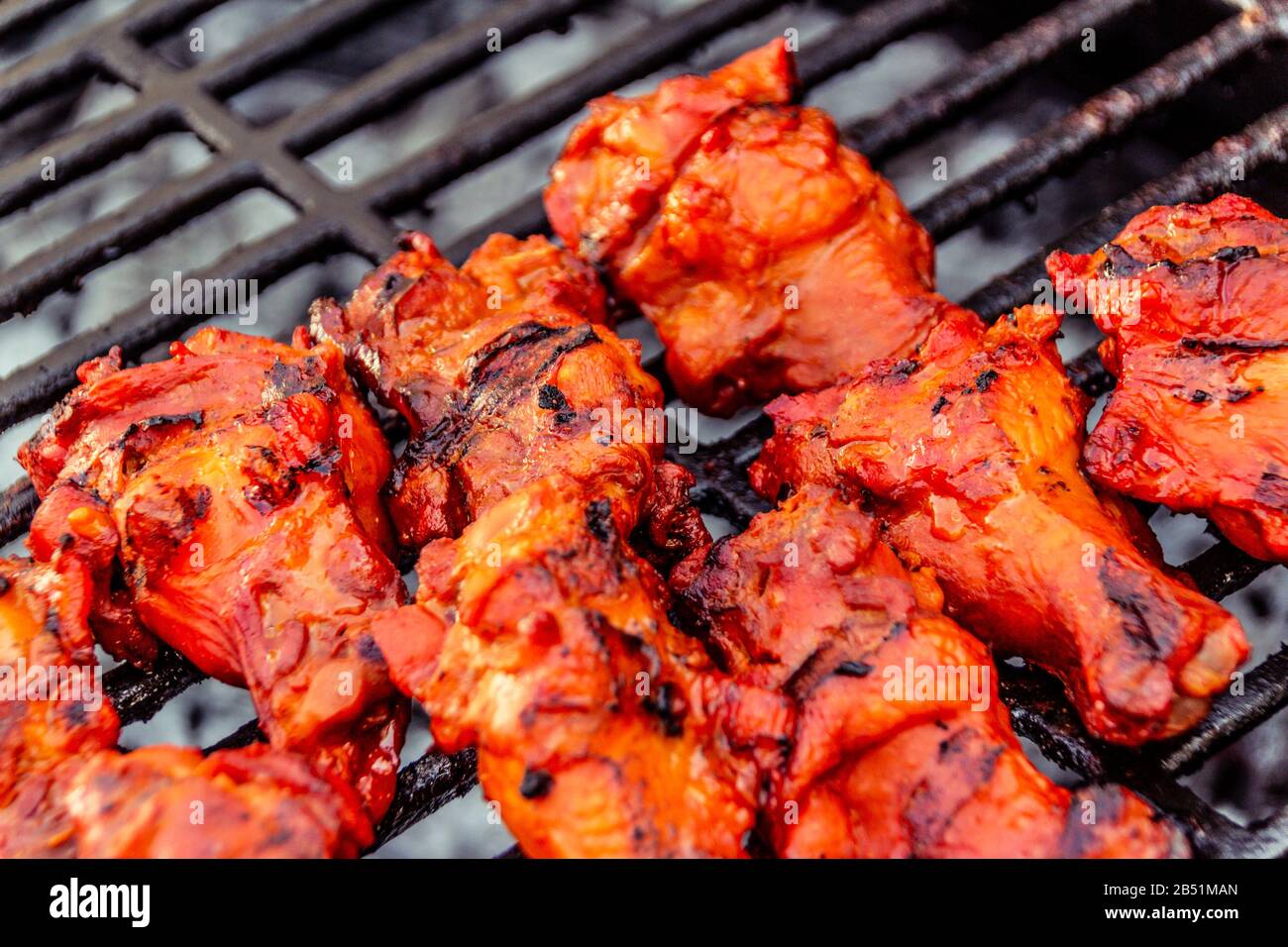 Photograph of some grilled chicken hot wings Stock Photo